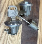 Chrysler Products Door Ignition Lock Set 62-65 Forward Look Aluminum Keys Nos. Fixed Price $155.00.